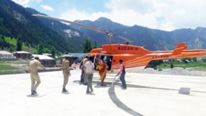 Passengers boarding Gurez-Srinagar chopper on Sunday. 