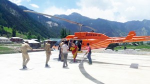 Passengers boarding Gurez-Srinagar chopper on Sunday.