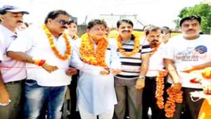 MLA Rajesh Gupta kick starting work on community hall on Monday.