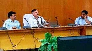 Regional Director Amit Sharma addressing a meeting of revenue officers.
