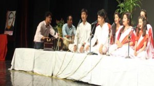 Singers presenting song during tributes paying function of Pt. Dina Nath Koul Nadim at Jammu on Saturday.