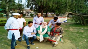 ESRM artists presenting Nukkad ‘Mera Kaam Kab Hoga’ at Gole Market Park, Gandhi Nagar Jammu on Monday.