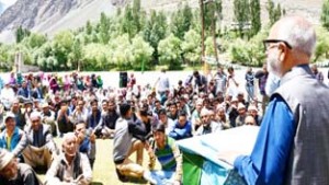 Minister for Public Works, Naeem Akhtar addressing a public gathering in Kargil on Friday.