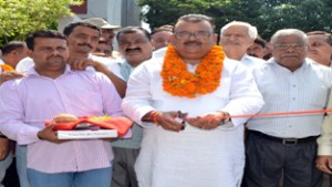 Minister for Industries & Commerce, Chander Parkash Ganga inaugurating developmental works at Bari Brahmana on Friday.