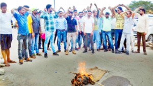 Katra MC workers protesting against authorities on Friday.