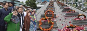 Chief Minister Mehbooba Mufti paying floral tributes to 1931 martyrs in Srinagar on Thursday. -Excelsior/Shakeel