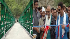 Minister for Public Works, Naeem Akhtar inaugurating a bridge in Kargil on Thursday.