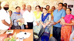 Beneficiaries of the BMD camp held at ESI Dispensary, Talab Tillo, Jammu on Thursday.