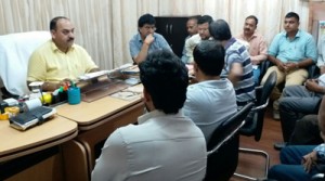 Vice Chairman JAKFED chairing a meeting with officials in Jammu on Friday.