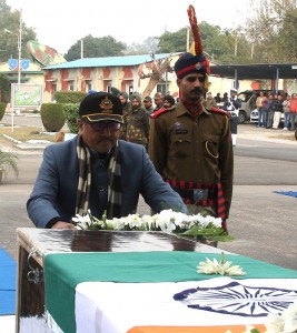 DyCM Dr Nirmal Singh paying tributes to martyrs in Jammu on Sunday. 