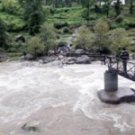 A foot-bridge washed away in Dudu area of Udhampur on Friday. 