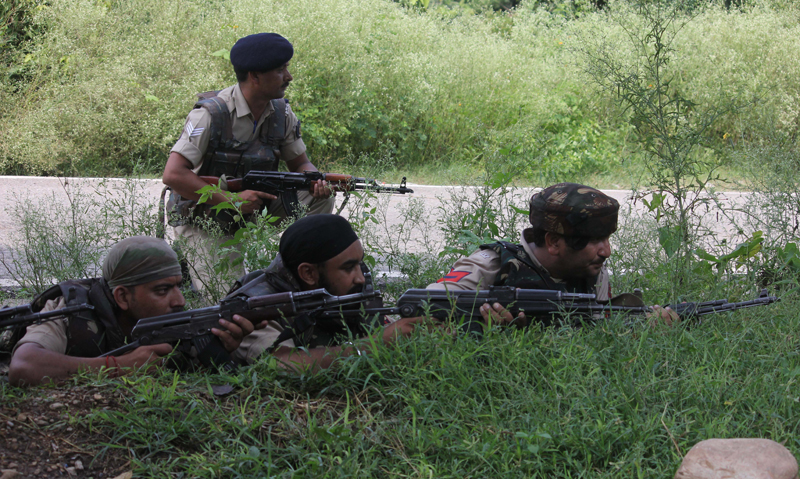 Troops in action during the gun battle at Dirthi, Kakryal on Thursday. —Excelsior/Rakesh