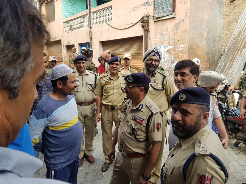 DGP Dilbag Singh inter-acts with people in Kishtwar on Sunday. 