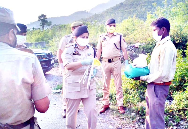SSP Reasi Rashmi Wazir providing ration and essential items to needy people in Marhi area of District Reasi.