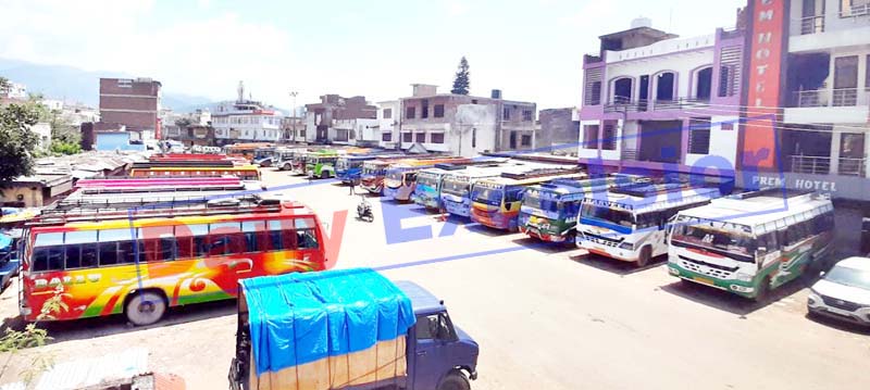 Buses remain parked at Udhampur Bus Stand due to lockdown on Saturday.-Excelsior/K Kumar