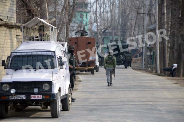 Security forces near encounter site at Naina Batapora in Pulwama.-Excelsior/Younis Khaliq