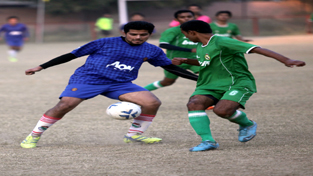 Footballers displaying dribbling and weaving technique during a football match at GGM Science College Ground on Tuesday. —Excelsior/Rakesh