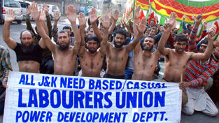 PDD casual and need based workers protesting in front of CE’s office on Wednesday. -Excelsior/Rakesh PDD casual and need based workers protesting in front of CE’s office on Wednesday. -Excelsior/Rakesh