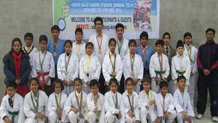 Medalists of Jodhamal Public School posing for a group photograph during felicitation function.