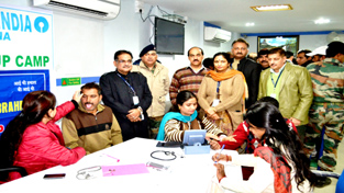 Doctors examining the patients during free medical camp organised by SBI Bari Brahmana on Thursday.
