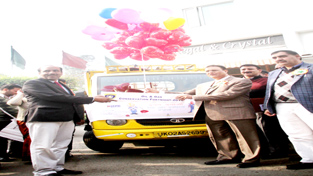 CAPD Minister Choudhary Mohammad Ramzan releasing ballons to inaugurate OGCF at Jammu on Thursday. -Excelsior/Rakesh