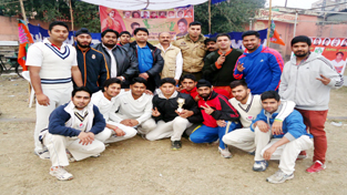 Winners posing for a photograph during a quarterfinal match of BJYM's 'Khelega Yuva Jeetega Bharat' Cricket Tournament at Parade ground on Thursday.