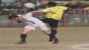 Tough tussle going on between the footballers to get hold of the ball during a football match in Jammu on Wednesday. -Excelsior/ Rakesh Tough tussle going on between the footballers to get hold of the ball during a football match in Jammu on Wednesday. -Excelsior/ Rakesh