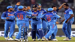India's fielders celebrate the dismissal of Australia's Aaron Finch during their ICC Twenty20 World Cup match at Sher-e-Bangla National Cricket Stadium in Mirpur on Sunday. (UNI)