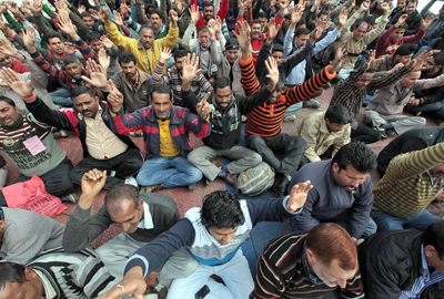 Casual labourers protesting at Jammu on Wednesday. -Excelsior/Rakesh Casual labourers protesting at Jammu on Wednesday. -Excelsior/Rakesh