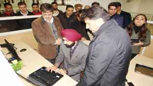 Officials during launch of e-governance web portal at Srinagar on Wednesday.