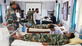 Jawans of Rashtriya Rifles Battalion donating blood during a camp at Thannamandi.