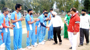 Chief guest interacting with the players of Glamorous Cricket Club in Poonch on Tuesday.