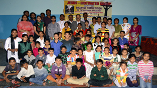 Winners of Drawing Competition posing along with the dignitaries on Monday. Winners of Drawing Competition posing along with the dignitaries on Monday.