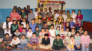 Winners of Drawing Competition posing along with the dignitaries on Monday.