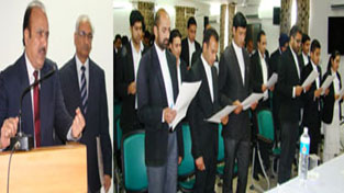 Justice Hasnain Masoodi administering oath to newly enrolled Advocates at Jammu on Thursday.