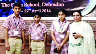 Students of Jodhamal Public School posing alongwith their incharge after excelling in Doon School's International Conference.