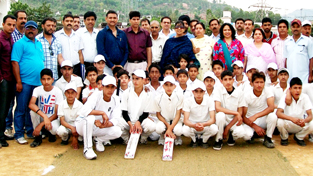 Budding cricketers posing for a group photograph alongwith DDC Udhampur, Yasha Mudgal at Subash Stadium in Udhampur on Friday. Budding cricketers posing for a group photograph alongwith DDC Udhampur, Yasha Mudgal at Subash Stadium in Udhampur on Friday.