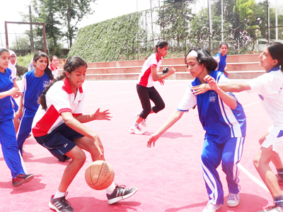 Young cagers in action during Under-14 girls basketball competition. Young cagers in action during Under-14 girls basketball competition.