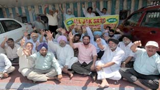 VRS employees raising slogans during protest at Jammu on Monday. -Excelsior/Rakesh