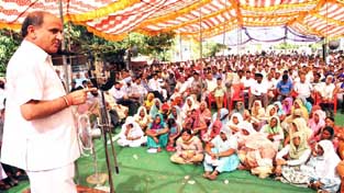 Deputy Chief Minister Tara Chand addressing public meeting at Khour on Saturday. Deputy Chief Minister Tara Chand addressing public meeting at Khour on Saturday.