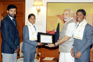 Poorna Malavath and Anand Kumar, teenaged mountaineers who recently scaled Mt. Everest, calling on the Prime Minister, Narendra Modi, in New Delhi onFriday. Poorna Malavath and Anand Kumar, teenaged mountaineers who recently scaled Mt. Everest, calling on the Prime Minister, Narendra Modi, in New Delhi onFriday.