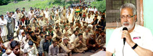 Minister for Health, Taj Mohi-ud-Din addressing public gathering at Uri on Monday.