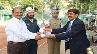 Winners being felicitated by the chief guest during the concluding ceremony of inter-battalion lawn tennis and badminton tournaments. Winners being felicitated by the chief guest during the concluding ceremony of inter-battalion lawn tennis and badminton tournaments.