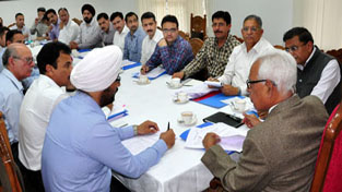 Governor N N Vohra interacting with Camp Directors at Srinagar on Wednesday.