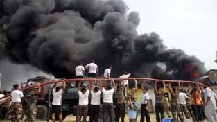 Fire fighters in action. -Excelsior/ Rakesh