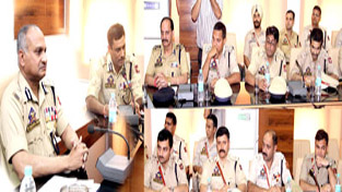 DGP K Rajendra Kumar chairing a meeting of officers at Jammu on Wednesday.