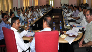Minister for PHE, Sham Lal Sharma chairing a meeting at Jammu on Monday.