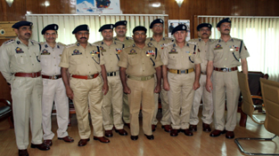 Newly promoted SSPs posing with ADGP Armed S M Sahai and IGP Armed Sunil Kumar at APHQ Srinagar on Monday.