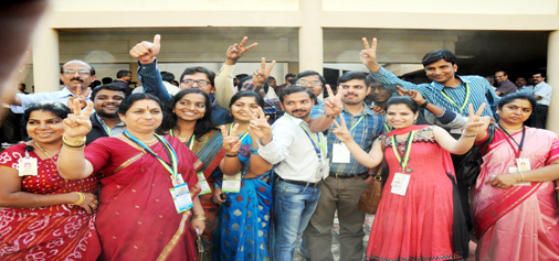 Indian Space Research Organisation (ISRO) scientists and officials celebrate the success of Mars Orbiter Mission at Telemetry, Tracking and Command Network complex in Bangalore on Wednesday (UNI)
