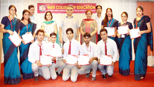 Students of MIER posing alongwith staff members during prize distribution function. Students of MIER posing alongwith staff members during prize distribution function.